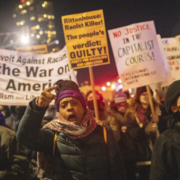Protestors in Manhattan demonstrate on Nov. 19, 2021, after the acquittal of Kyle Rittenhouse of charges related to deadly shootings at a riot in Kenosha, Wisconsin (Jeenah Moon / Associated Press)