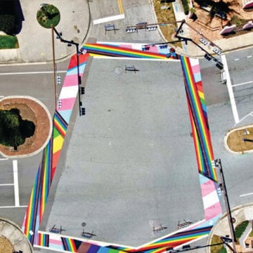 Pride Walk street mural showing the colors of the rainbow, gender studies, DEI