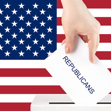 voting in the usa, a hand with a ballot for the republicans against the background of the american flag puts the vote in the ballot box, congressional elections, the senate Trump Draws the Boldest Line