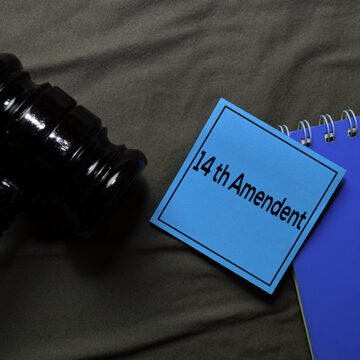 14th Amandment text on sticky notes and gavel isolated on office desk. Law concept John Roberts, Birthright Citizenship, and Our Constitutional Straitjacket