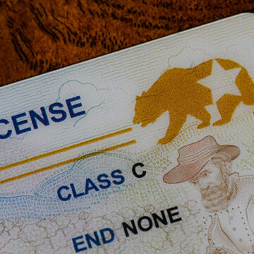 Lake Elsinore, California, USA - Dec 18, 2022: Closeup of California Real ID driver license focusing on the REAL ID logo California’s Election Fraudyssey