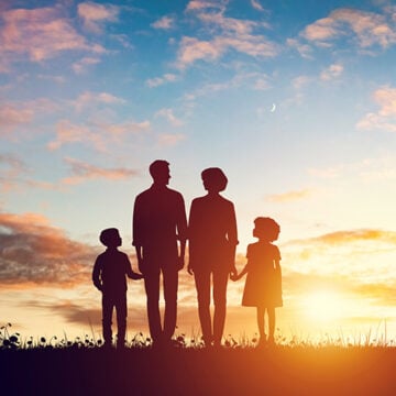 Happy family together at sunset. Parents with their children Former White House Official Examines ‘What Really Matters’